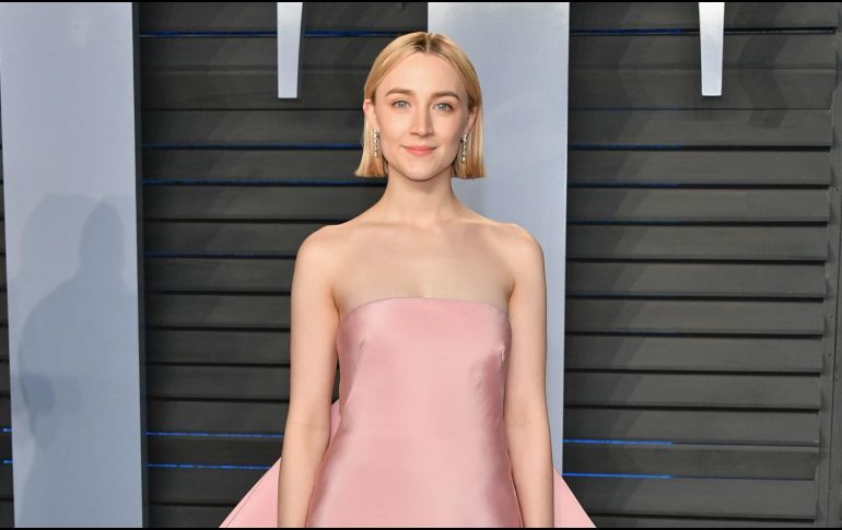 Saoirse Ronan dejó ver su embarazo en una alfombra roja en Francia. AFP/ARCHIVO