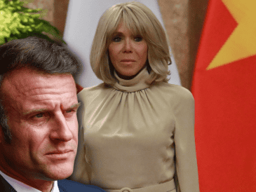 En el video se muestra cómo la primera dama francesa dirige ambas manos contra el rostro de su marido cuando recién se abría la puerta del avión. EFE/C. Thirasupa EFE/N. Nguyen