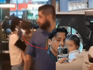 Nodal se sube a una camioneta blanca que lo espera mientras personal lo acompaña al momento que el cantante se sube al vehículo. ESPECIAL