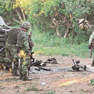 Dictan prisión preventiva a 11 exmilitares colombianos por ataque en Michoacán