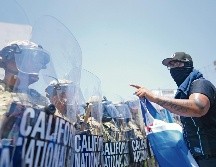 La intensidad de las protestas requirió de medidas duras de Donald Trump. AP