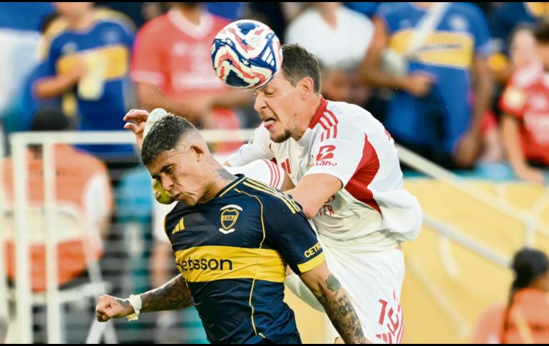 Tanto el club argentino como el portugués brindaron un encuentro ríspido que les dio un punto a ambos. AFP/P. De Melo