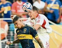 Tanto el club argentino como el portugués brindaron un encuentro ríspido que les dio un punto a ambos. AFP/P. De Melo