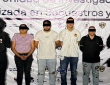 Andrés Felipe “N”, Yahir Franco “N”, Hosnader Alfredo “N” —de nacionalidad colombiana— y Jennifer Yessica “N” —mexicana—, quedaron detenidos para que respondan por el delito de extorsión. ESPECIAL / Fiscalía de Jalisco