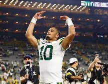 Jordan Love completó 292 yardas lanzadas y dos anotaciones. AFP/M. Reaves