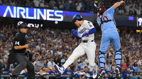 Hyeseing Kim, de los Dodgers de Los Ángeles, anota la carrera decisiva ante un mal disparo a home del pitcher Orion Kerkering. AP/M. Terrill
