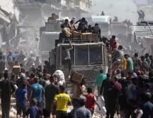 El acuerdo de tregua, firmado el miércoles en Egipto, permitirá el ingreso diario de hasta 600 camiones de ayuda. EFE / H. IMAD