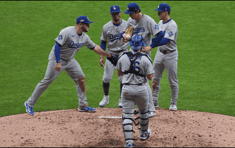 Jugadores de los Dodgers, en el primero juego de la serie ante los Brewers. EFE / R. Harried