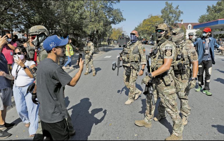 El DHS ha mencionado que grupos de izquierda y pandillas hispanas espían a los agentes en Portland y en Chicago. AFP/O. Jones