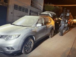 Al interior de los vehículos se reportó la presencia de armas de fuego y cartuchos. ESPECIAL / SSE