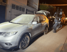 Al interior de los vehículos se reportó la presencia de armas de fuego y cartuchos. ESPECIAL / SSE