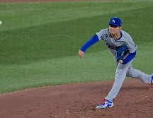 Con su 'performance' de hoy, Yamamoto completó quince entradas de dos carreras y 14 ponches en dos aperturas durante la Serie Mundial. EFE / E. Lima