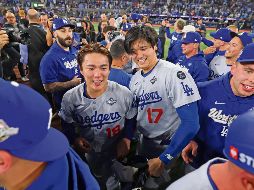 Yoshinobu Yamamoto (izq.) y Shohei Ohtani mantuvieron en vilo a sus compatriotas.AFP/G. Shamus