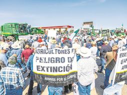 Mientras Tlajomulco y el Gobierno de Jalisco aumentan apoyos a los maiceros, éstos amenazan con repetir bloqueos a nivel nacional el próximo 24 de noviembre, por diferencias con el Gobierno federal. EL INFORMADOR/ A. Navarro