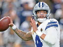 Dak Prescott hizo cuatro pases de anotación y sumó 246 yardas. AFP/C. Petersen