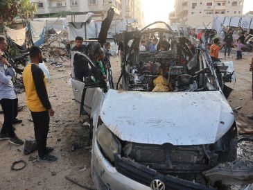 Los bombardeos israelíes causaron al menos 21 muertos en Ciudad de Gaza y en Deir al Balah y Nuseirat, indicó Mahmud Basal, vocero de la Defensa Civil. AFP / O. Al-Qatta