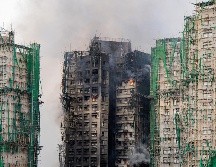 La última información disponible sobre los residentes atrapados dentro de los inmuebles indicaba que había 62 personas en esta situación. EFE/L. MAN HEI