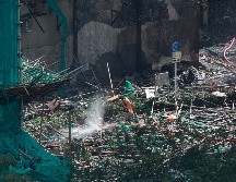 Los equipos estaban priorizando las viviendas desde las cuales recibieron más de dos docenas de llamadas de auxilio, pero a las que no pudieron llegar. EFE/M. JAMES