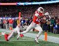 Los Patriots alcanzan una marca de 11-2, dejando a los Giants hundidos en un 2-11. AP/ C. Krupa.