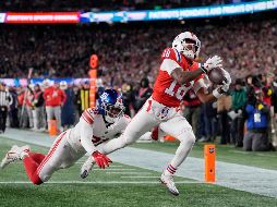 Los Patriots alcanzan una marca de 11-2, dejando a los Giants hundidos en un 2-11. AP/ C. Krupa.