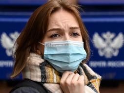 El nuevo virus de la influenza ha traído de regreso la mascarillas en el Reino Unido. AFP/K. Kudryavtsev