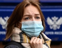El nuevo virus de la influenza ha traído de regreso la mascarillas en el Reino Unido. AFP/K. Kudryavtsev