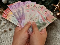 Navidad es día libre para las y los trabajadores en México. Esto significa que quienes laboren con normalidad deben percibir el pago de su día más el doble de su salario. ESPECIAL / CANVA