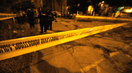 Especialistas de la Fiscalía General del Estado procesaron el sitio y trasladaron los indicios y restos a la sede ministerial para la identificación oficial. EL INFORMADOR/ ARCHIVO