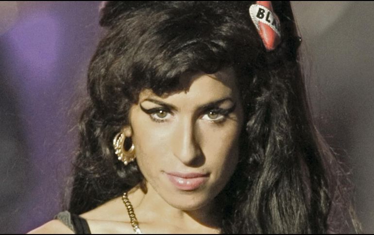 Amy Winehouse fue una de las voces más influyentes del soul contemporáneo, falleció en 2011 a los 27 años. AFP