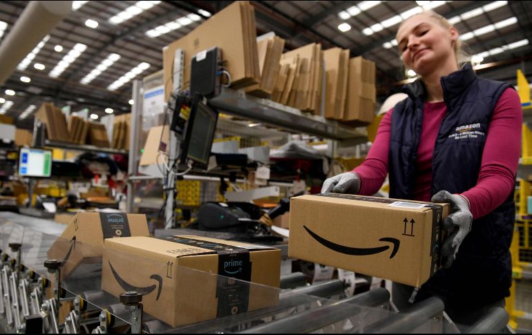 Amazon argumenta que ajusta su plantilla después del auge que supuso el confinamiento por la pandemia de COVID-19. AFP/Archivo