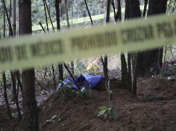 Al llegar al lugar se acordonó el área para iniciar con el procesamiento con la intervención de criminalistas de campo y de la Fiscalía Especializada en Investigación de Personas Desaparecidas. SUN/ ARCHIVO