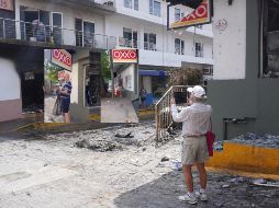 Se vuelven virales videos de extranjeros hurtando cosas de una tienda abandonada. EFE / ARCHIVO