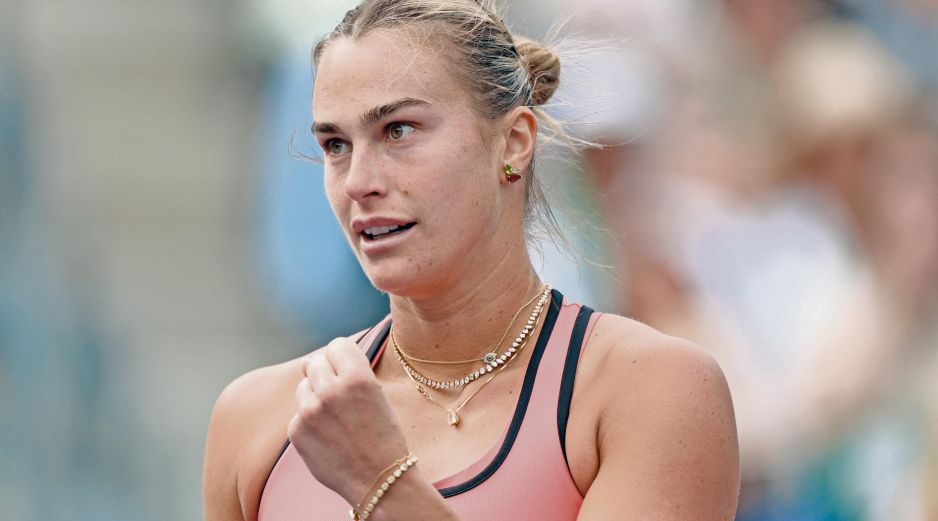 La bielorrusa celebró su partido número 100 como número uno del mundo. AFP/H. How