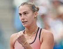 La bielorrusa celebró su partido número 100 como número uno del mundo. AFP/H. How