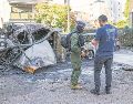 Secuelas de un ataque contra Tel Aviv. Irán lanzó misiles contra la capital israelí, donde las autoridades han recomendado el uso de búnkeres para los ciudadanos. AFP