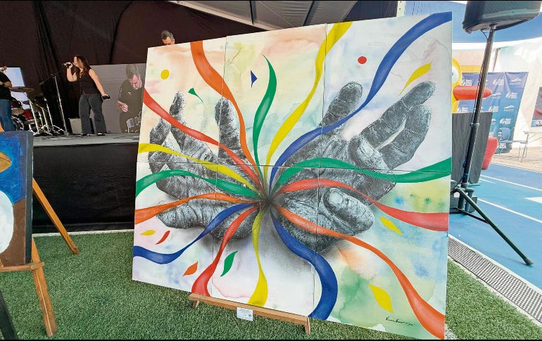 Alumnos de séptimo grado trabajaron junto a Víctor Haro en un políptico colectivo. EL INFORMADOR/H. Navarro